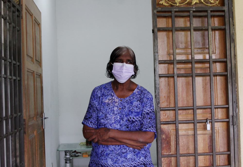 S. Thava Sagayamu00e2u20acu2122s widow E. Philomena, after receiving a total of RM14,737 and a lifelong pension from Socso September 3, 2021, for his death from head injuries suffered during an assault while on duty as a security guard in December. u00e2u20acu201d Bernama pic 