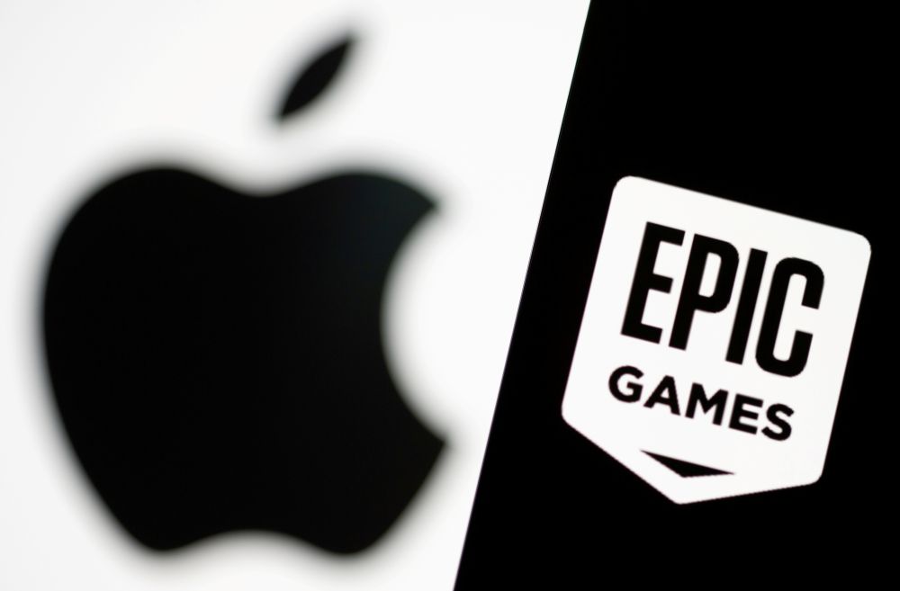 Smartphone with Epic Games logo is seen in front of Apple logo in this illustration taken, May 2, 2021. u00e2u20acu201d Reuters pic