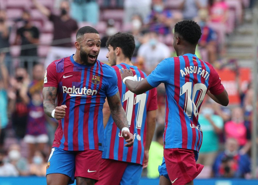 FC Barcelona's Ansu Fati celebrates scoring their third goal against Levante with Memphis Depay at Camp Nou, Barcelona September 26, 2021. u00e2u20acu201d Reuters pic