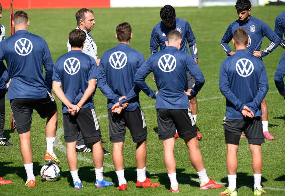 Hansi Flick, new head coach of the German national football team, talks to his players during a training session of Germanyu00e2u20acu2122s national football team in Stuttgart, southern Germany, September 1, 2021. u00e2u20acu201d AFP pic 