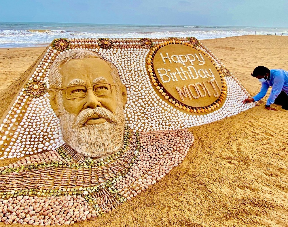 Sudarsan Pattnaik designed a sand sculpture for PM Narendra Modi's 71st birthday using 2,035 shells. u00e2u20acu2022 Picture via Twitter/SudarsanPattnaik
