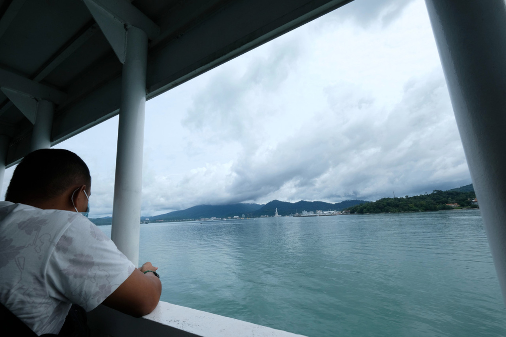 Tourists from Kuala Perlis enjoying the view from RORO Langkawi Auto Express heading to the island following its reopening September 14, 2021. u00e2u20acu201d Bernama pic 