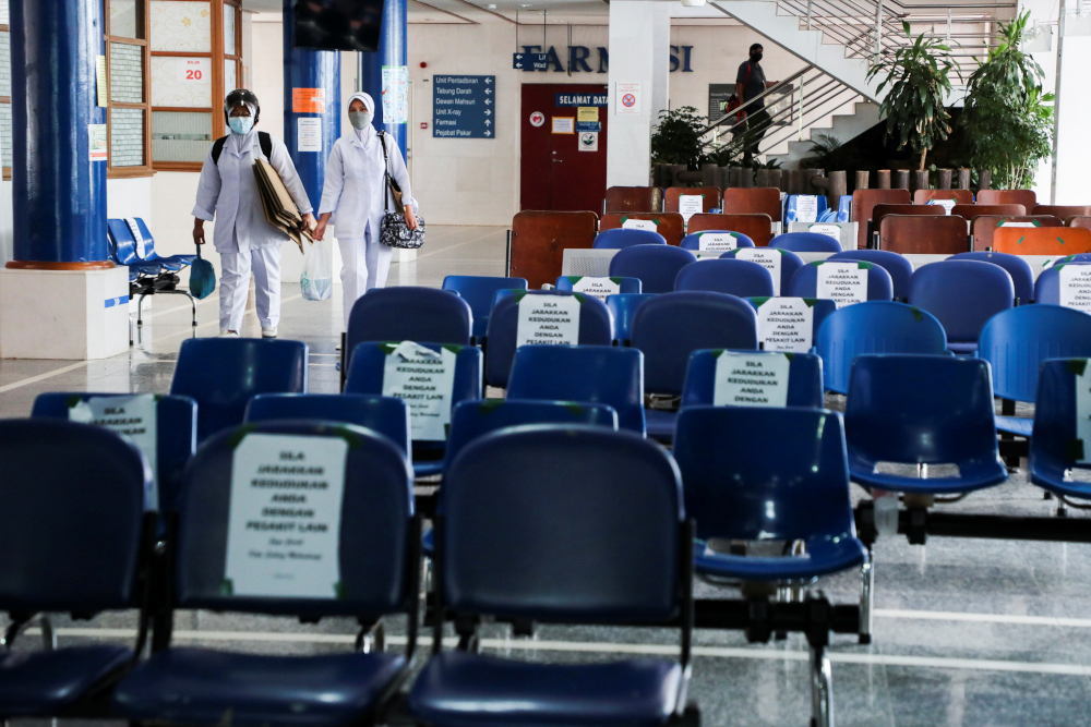 Health workers walk past empty seats at Sultanah Maliha Hospital, amid the coronavirus disease outbreak in Langkawi, Malaysia September 15, 2021. u00e2u20acu201d Reuters pic 