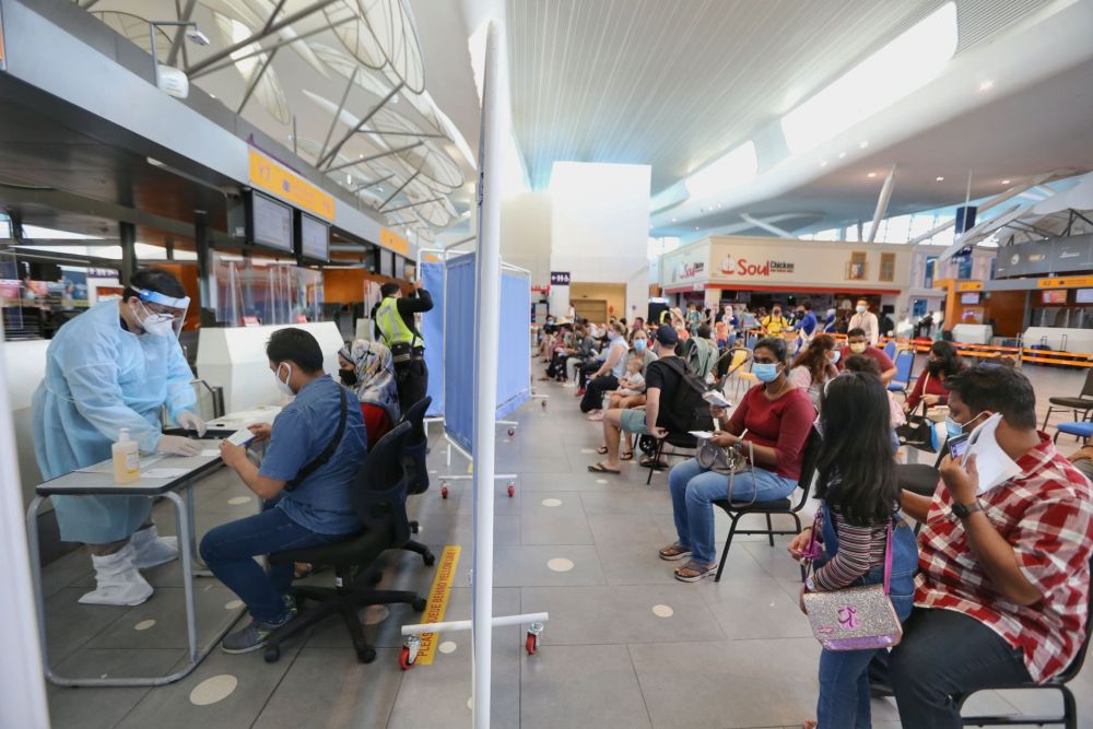 Travellers to Langkawi wait to test for Covid-19 at KLIA2, Sepang September 16, 2021. 