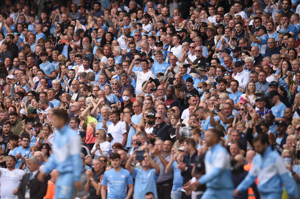 Manchester City fans greet their team ahead of the English Premier League football match between Manchester City and Southampton at the Etihad Stadium in Manchester, England, September 18, 2021. u00e2u20acu201d AFP pic 