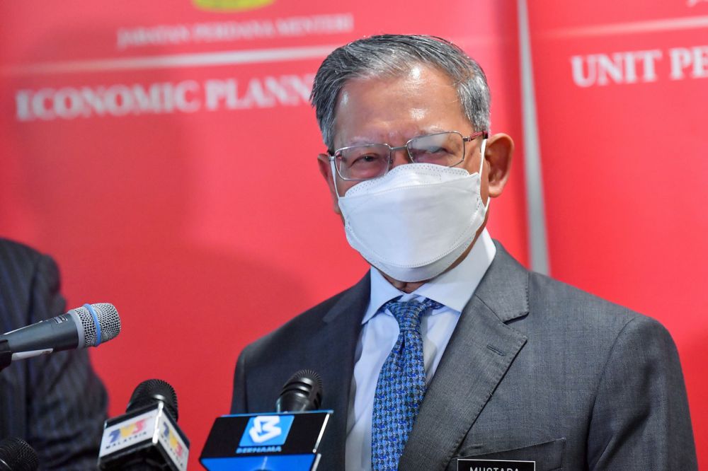 Datuk Seri Mustapa Mohamed addresses a media conference at the Setia Perdana Complex in Putrajaya September 1, 2021. u00e2u20acu201d Bernama pic