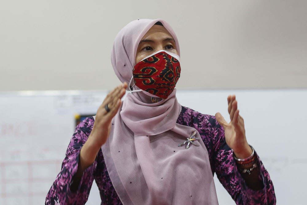 Permatang Pauh MP Nurul Izzah Anwar speaks to the press during the launch of the Covid 19 Emergency Careline at Dewan Pintar, Guar Perahu, September 9, 2021. u00e2u20acu201d Picture by Sayuti Zainudin