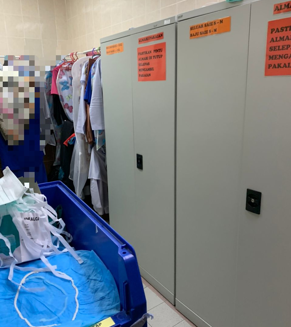 The changing room in the small operation theatre in Penang General Hospital where up to 10 surgical staff have to squeeze into this small space.