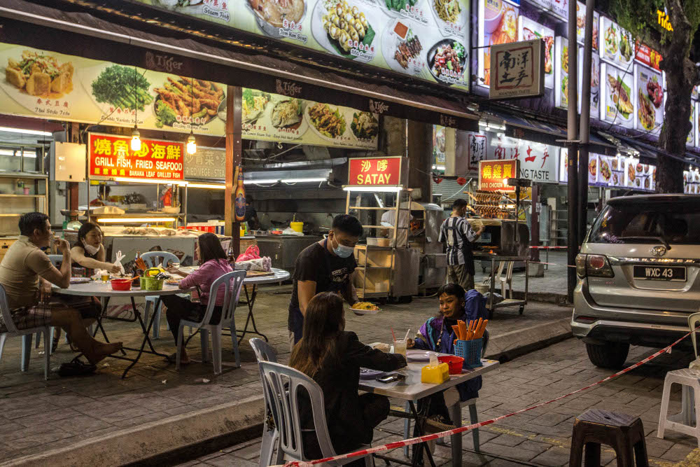 People dine-in at Jalan Alor during Phase One of the National Recovery Plan in Kuala Lumpur, September 2, 2021. u00e2u20acu201d Picture by Firdaus Latif