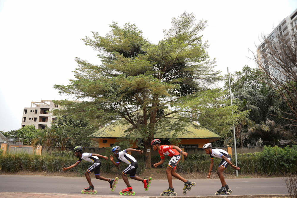 Serge Makolo leads his speed skating teammates during a training in Kinshasa, Democratic Republic of Congo September 16, 2021. — Reuters pic