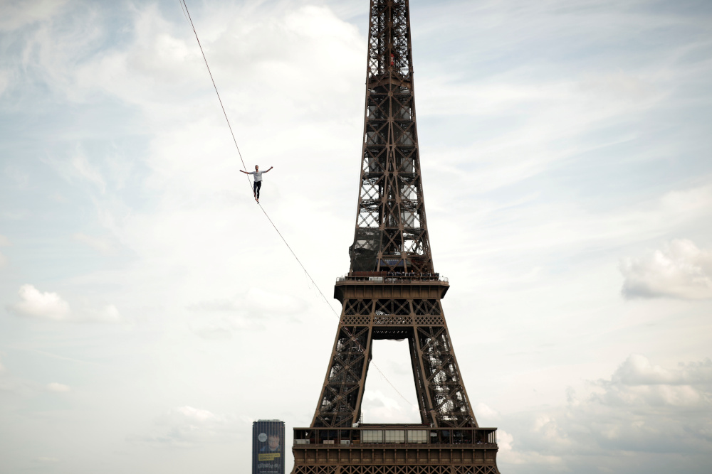 French acrobat Nathan Paulin walks on a slackline between the Eiffel Tower and the Theatre National de Chaillot as part of events around France for National Heritage Day in Paris September 18, 2021. u00e2u20acu201d Reuters pic