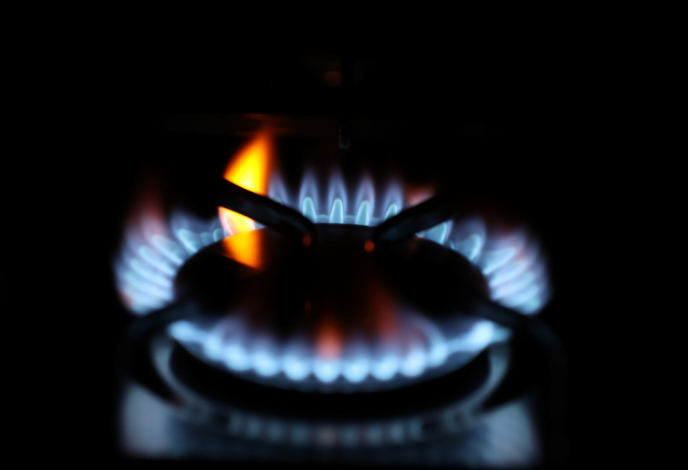 Flames come out of a domestic gas ring of an oven in Durham September 23, 2021. u00e2u20acu201d Reuters pic