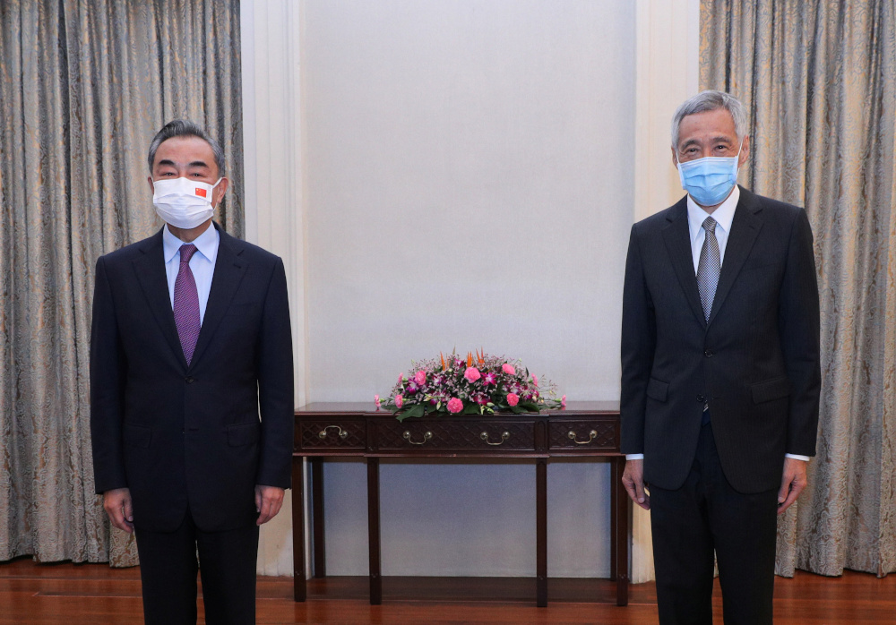 Chinau00e2u20acu2122s Foreign Minister Wang Yi meets with Singaporeu00e2u20acu2122s Prime Minister Lee Hsien Loong at The Istana in Singapore September 14, 2021. u00e2u20acu201d Ministry of Communications and Information Singapore handout pic via Reuters  