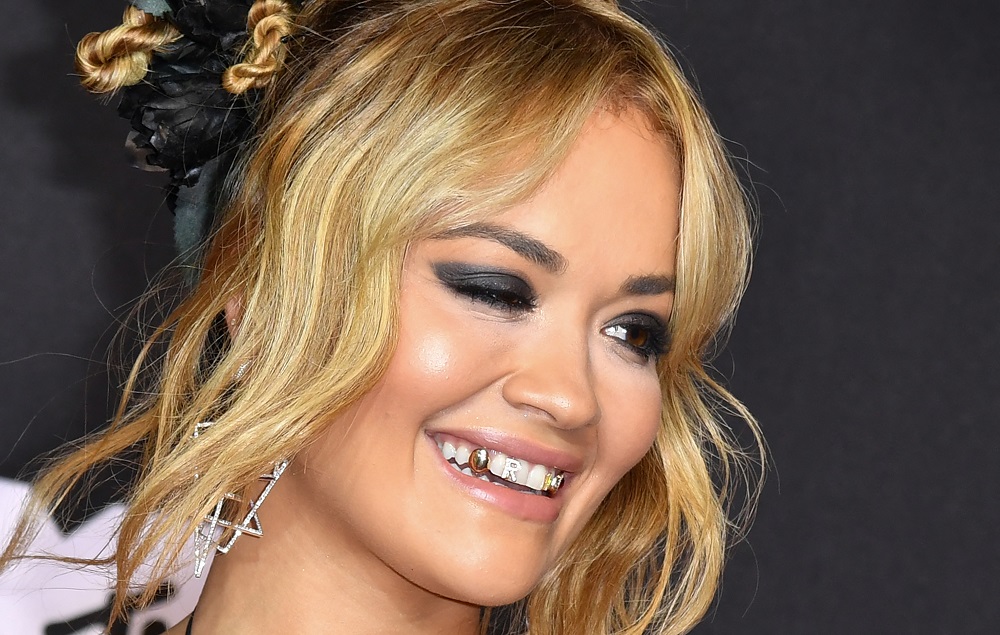 Rita Ora showed up at the MTV Video Music Awards with several tooth gems. u00e2u20acu2022 AFP pic