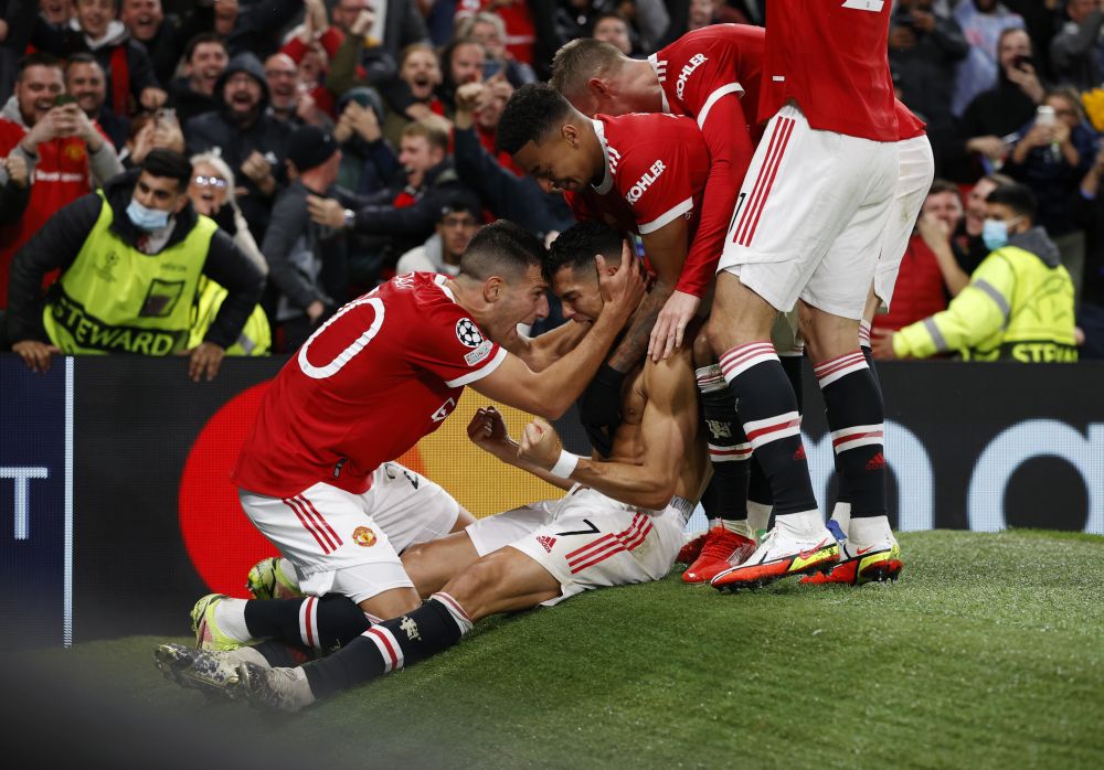 Manchester United's Cristiano Ronaldo celebrates after scoring against Villarreal with teammates at Old Trafford, Manchester September 29, 2021. u00e2u20acu201d Reuters pic  