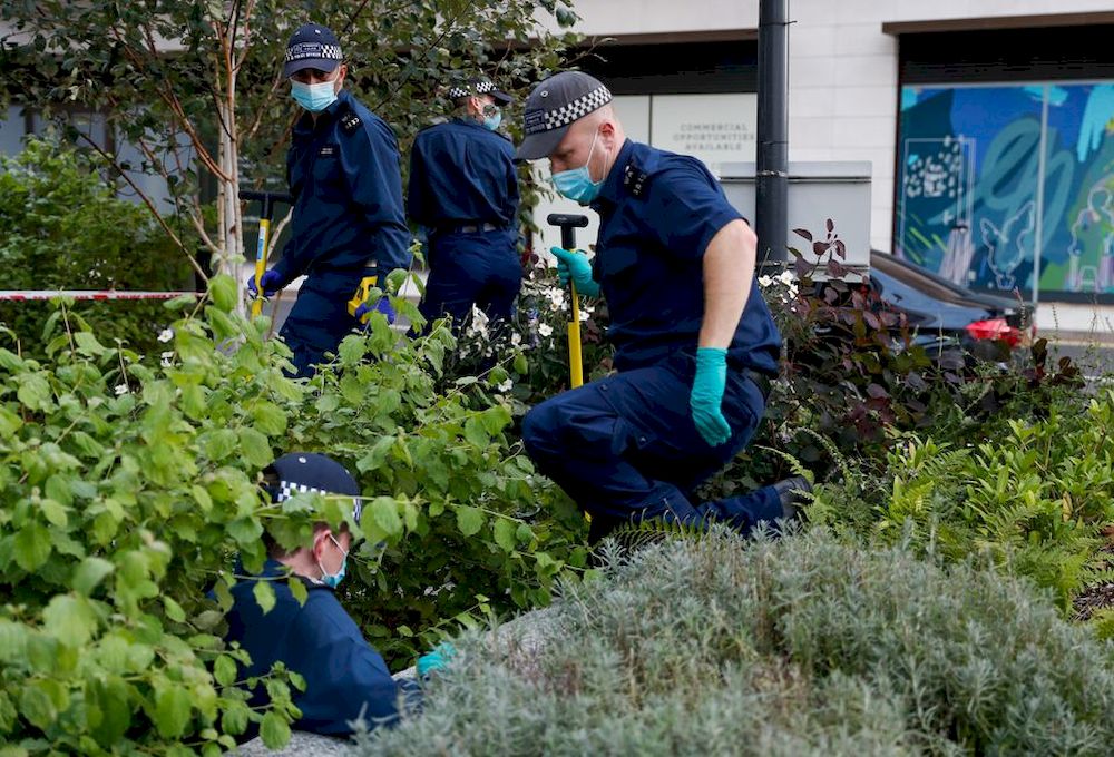 Police officers search the area prior to a vigil in memory of Sabina Nessa, a teacher who was murdered in Pegler Square, in London, Britain September 24, 2021. u00e2u20acu201d Reuters pic