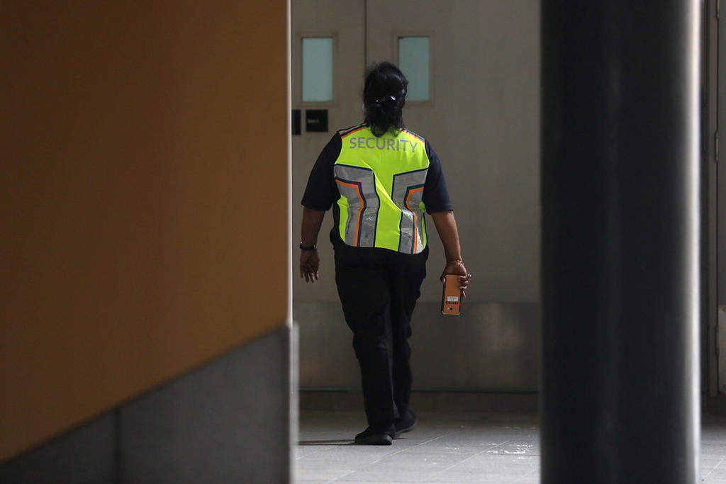 A security guard at work in a university on Sept 11, 2021. u00e2u20acu201d TODAY pic