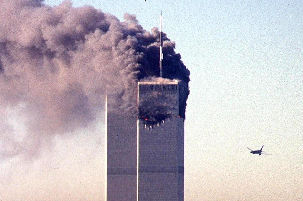 In this file photo taken on September 11, 2001, a hijacked commercial aircraft approaches the twin towers of the World Trade Centre shortly before crashing into the landmark skyscraper in New York. u00e2u20acu2022 AFP file pic