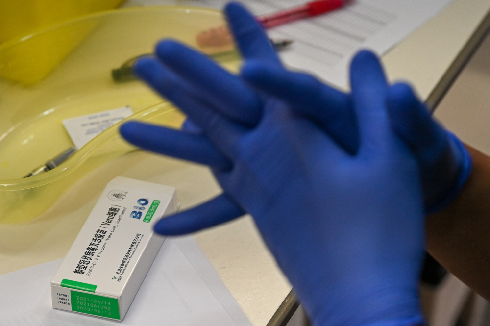 A nurse prepares a dose of the Sinopharm Covid-19 coronavirus vaccine at the Mount Elizabeth hospital vaccine centre in Singapore, September 7, 2021. u00e2u20acu201d AFP pic 