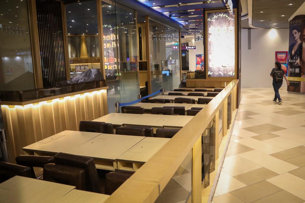 A view of a near-empty section in a mall when Singapore returned to a heightened alert phase in July 2021 due to a spike in coronavirus infections. u00e2u20acu2022 TODAY pic