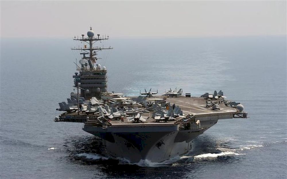 The Nimitz-class aircraft carrier USS Abraham Lincoln transits the Indian Ocean in this US Navy handout photo dated January 18, 2012. /US Navy/Chief Mass Communication Specialist Eric S. Powell/Handout/ Reuters pic