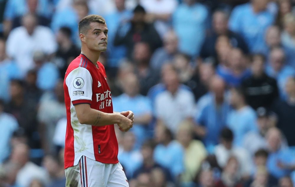 Arsenal's Granit Xhaka walks off the pitch after being shown a red card during the match against Manchester City at the Etihad Stadium, Manchester August 28, 2021. u00e2u20acu201d Reuters pic