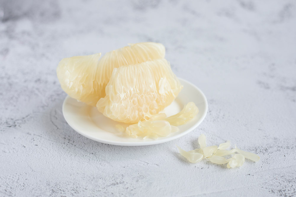 Juicy sacs of pomelo.