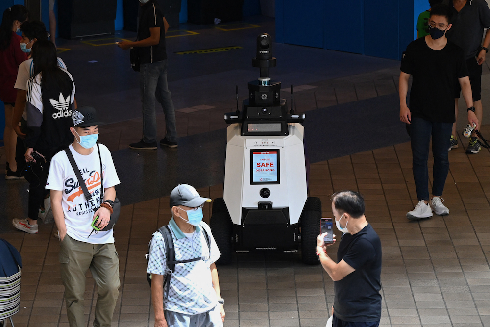 An autonomous robot named u00e2u20acu02dcXavieru00e2u20acu2122 patrols a shopping and residential district during a three-week trial by the Home Team Science and Technology Agency (HTX) in Singapore September 6, 2021. u00e2u20acu201d AFP pic 