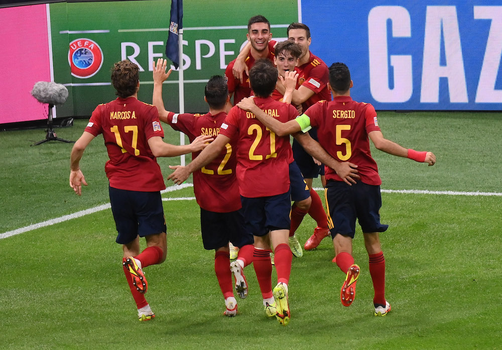 Spain's Ferran Torres celebrates scoring their second goal with teammates in Milan, Italy October 6, 2021. u00e2u20acu201d Pool via Reuters/Marco Bertorello