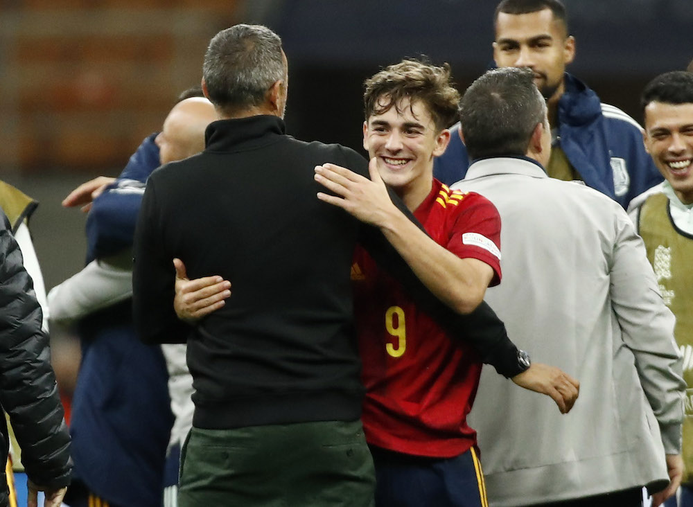 Spain coach Luis Enrique celebrates with Gavi after the match in Milan October 6, 2021. u00e2u20acu201d Reuters pic 
