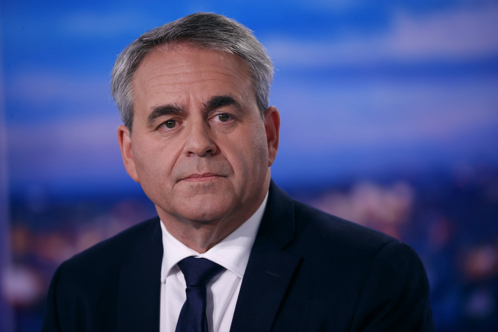 French President of Les Hauts de France region and candidate for the 2022 French presidential election Xavier Bertrand poses before the news broadcast of TF1 TV channel in Paris October 11, 2021. u00e2u20acu201d AFP pic
