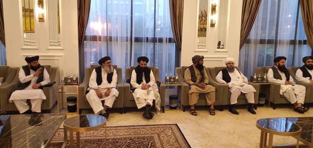 Taliban delegates meet with Qatar delegates in Doha, Qatar, in this handout photo uploaded to social media on October 9, 2021. u00e2u20acu201d Social media handout via Reuters