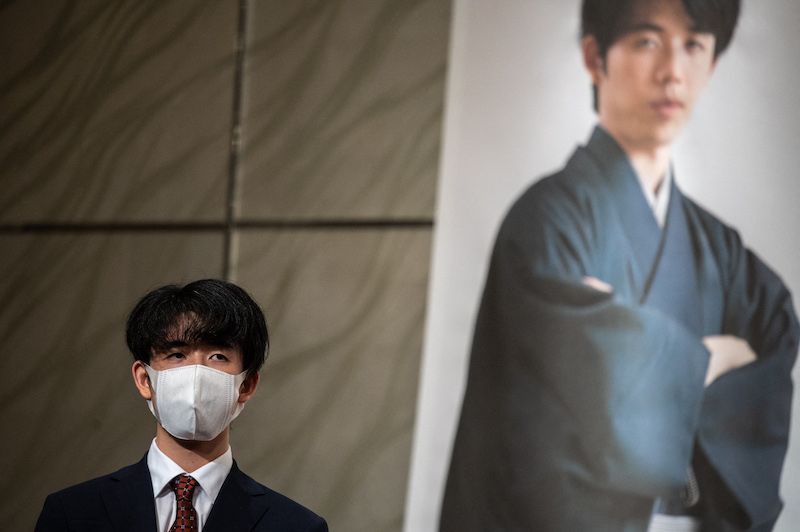 This picture taken on October 7, 2021 shows Japan's professional shogi player Sota Fujii posing for a photo call during a press conference of a competition between Masayuki Toyoshima, in Tokyo. u00e2u20acu201d AFP pic