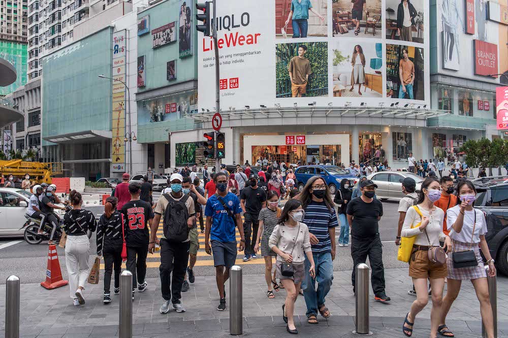 People are seen wearing masks at Jalan Bukit Bintang in Kuala Lumpur, October 2, 2021. — Picture by Shafwan Zaidon