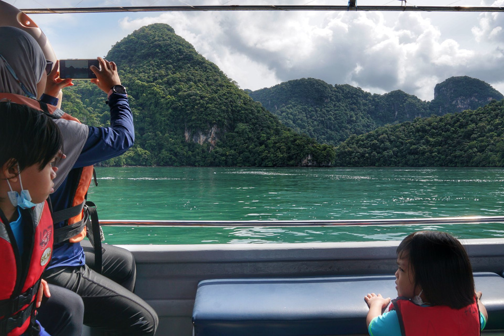 A tourist takes a picture of Pulau Dayang Bunting in Langkawi September 26, 2021. u00e2u20acu201d Picture by Ahmad Zamzahuri