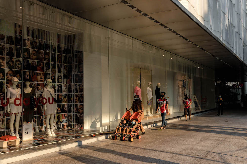 People are seen wearing protective masks as they walk along the Bukit Bintang shopping area in Kuala Lumpur on October 9, 2021. u00e2u20acu201d Picture by Firdaus Latif