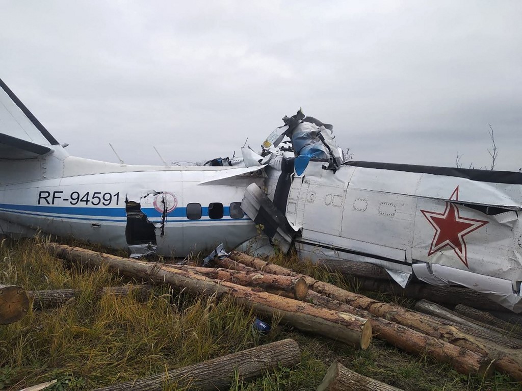 This handout picture taken and released on October 10, 2021 by the Russiau00e2u20acu2122s Emergencies Ministry shows a wreckage at a site of the L-410 plane crash near the town of Menzelinsk in the Republic of Tatarstan. u00e2u20acu201d AFP picn  n