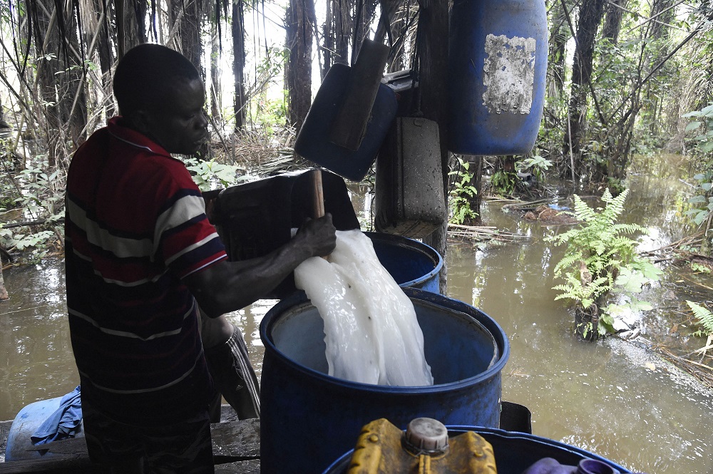 Wilson Ovwiroro is seen at his makeshift distillery in Sapele.Wilson Ovwiroro is seen at his makeshift distillery in Sapele. u00e2u20acu201d Picture by Pius Utomi EKPEI via AFP