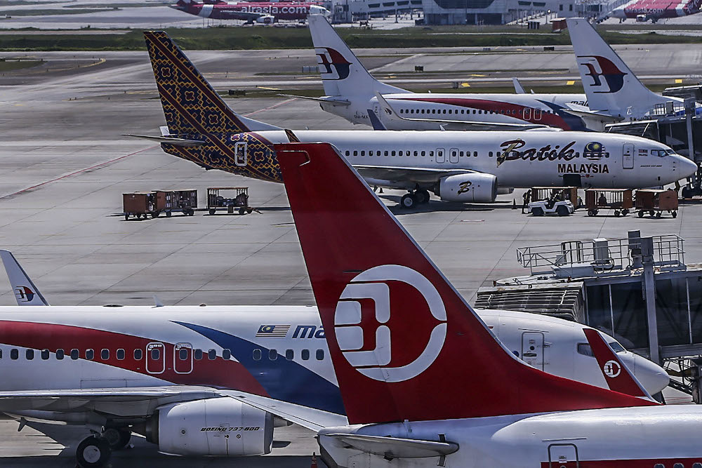 The queue of planes at Kuala Lumpur International Airport is scheduled to take off only at certain times since Malaysia was hit by the Covid-19 pandemic October 17, 2021. u00e2u20acu2022 Picture by Hari Anggara 