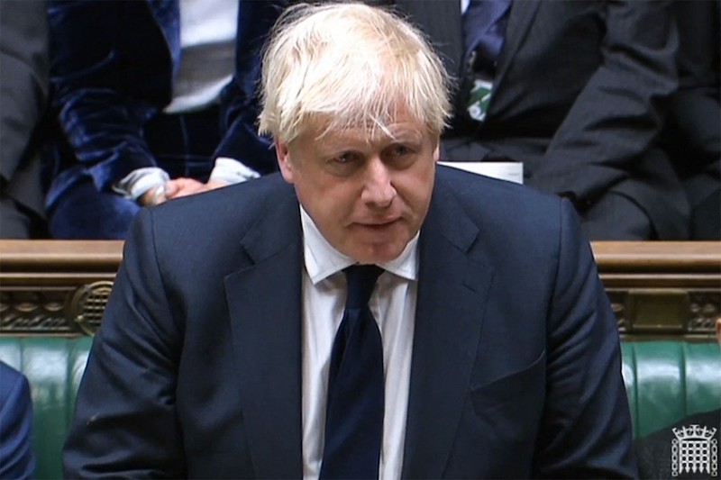 A video grab from footage broadcast by the UK Parliament's Parliamentary Recording Unit (PRU) shows British Prime Minister Boris Johnson addressing the House of Commons in London on October 18, 2021. u00e2u20acu201d AFP picnn