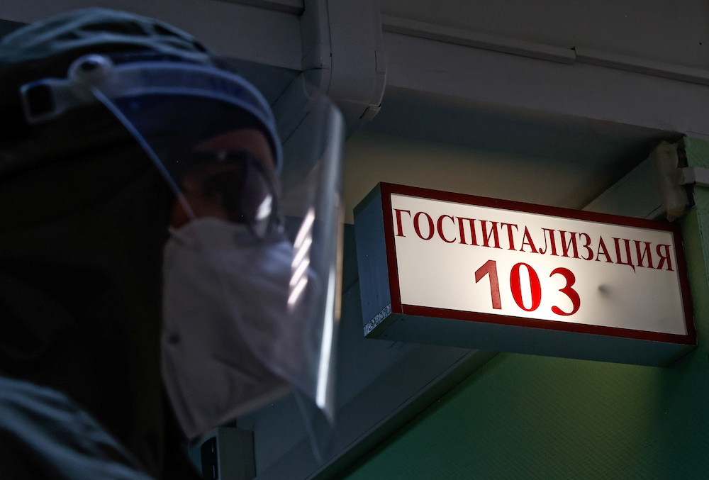 A medical specialist is pictured at the City Clinical Hospital Number 52, where people suffering from the coronavirus disease (Covid-19) are treated, in Moscow, Russia October 21, 2021. The sign reads: u00e2u20acu02dcHospitalisationu00e2u20acu2122. u00e2u20acu201d Reuters pic