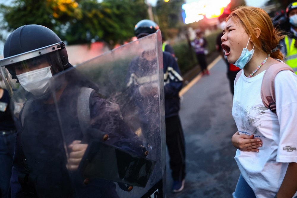 An anti-government protester shouts at riot police during a demonstration in Bangkok September 28, 2021. u00e2u20acu201d AFP pic