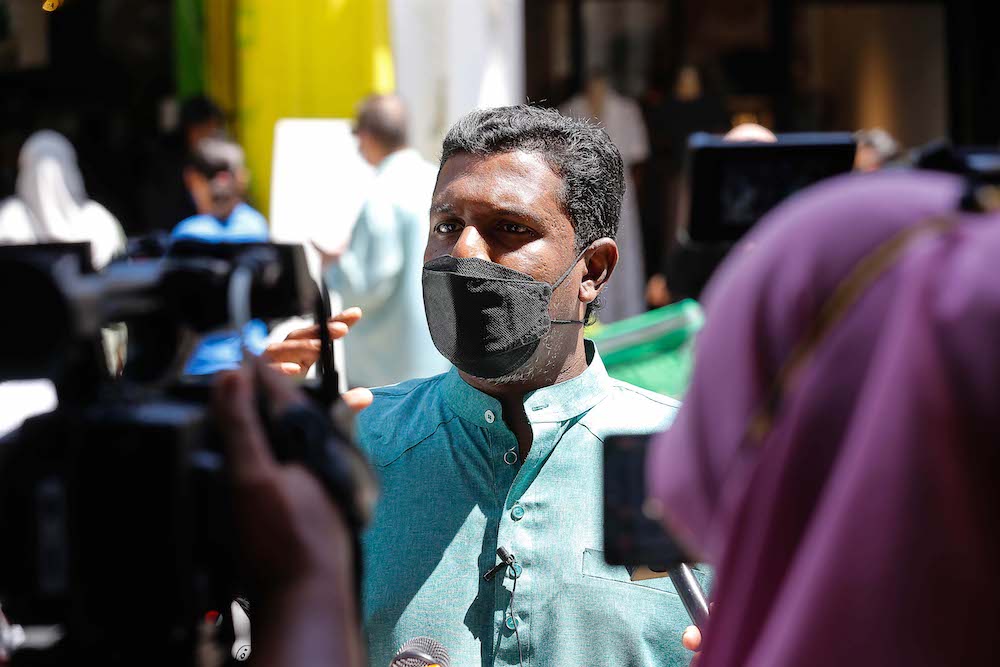 Indian-Muslim Community Association President Mohamed Rizwan Abdul Ghafor Khan speaks to the press about problems faced by nasi kandar operators during an interview in George Town, Penang October 22, 2021. — Picture by Sayuti Zainudin
