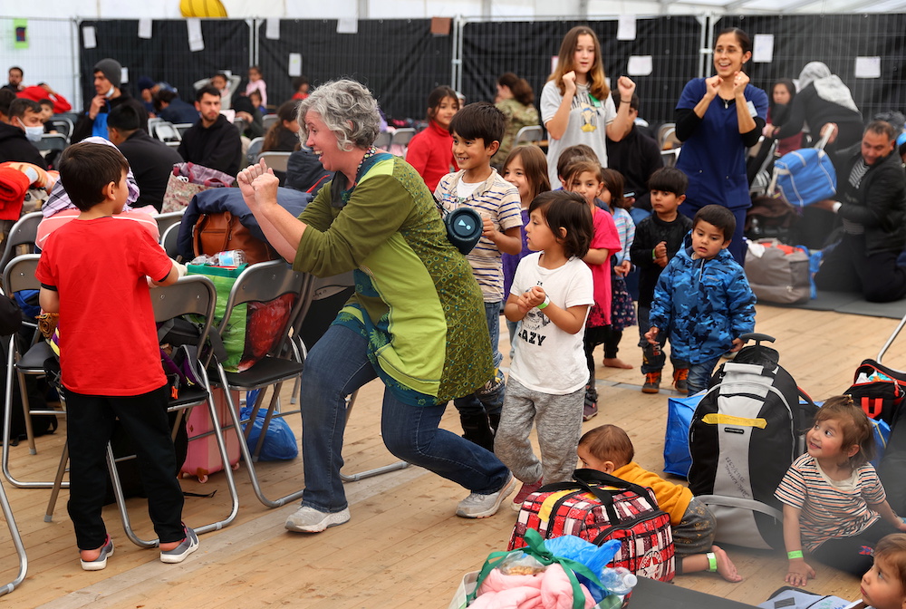 Children evacuated from Afghanistan pass time at the US airbase in Ramstein, where Afghan evacuees stay before boarding commercial planes for the United States, Germany, October 9, 2021. u00e2u20acu201d Reuters picnn