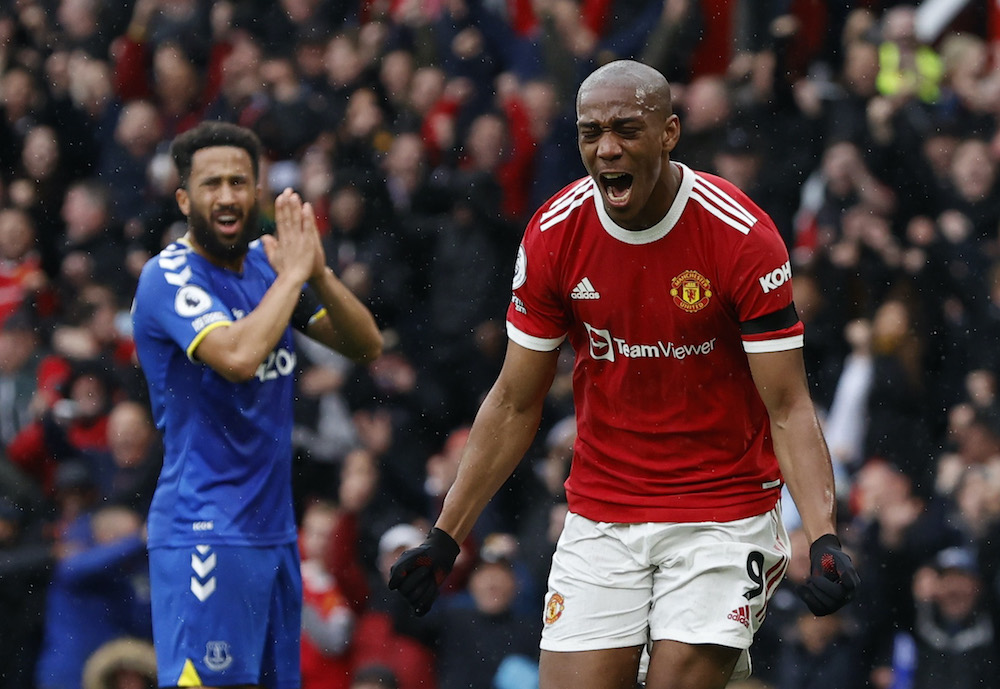 Manchester Unitedu00e2u20acu2122s Anthony Martial celebrates scoring their first goal as Evertonu00e2u20acu2122s Andros Townsend reacts during the match at the Old Trafford in Manchester, October 2, 2021u00e2u20acu2022 Reuters pic