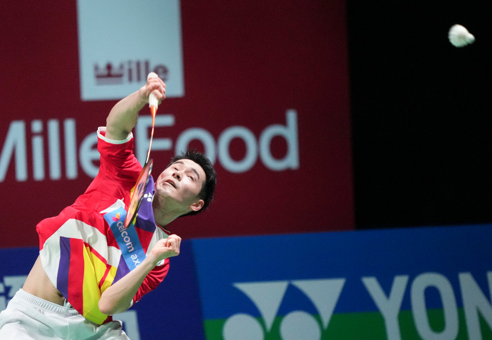 Malaysia’s Cheam June Wei plays a ball during a men’s single match of the Badminton Thomas Cup between Japan and Malaysia in Aarhus, Denmark, October 14, 2021. — AFP pic