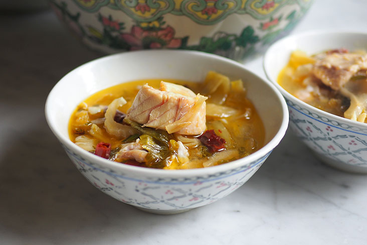 The appetising 'suan chai yu' or preserved cabbage and fish soup is served with a piece of smooth, jelly like texture for the fish