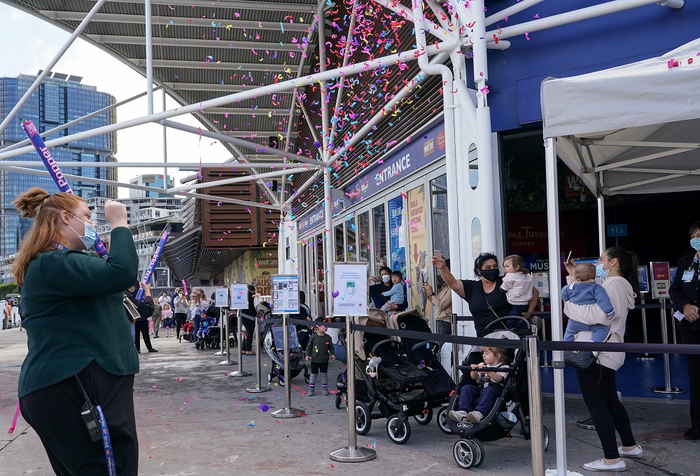 Staff members shoot confetti in the air to celebrate the re-opening to visitors at SEA LIFE Sydney Aquarium, following an extended closure due to Covid-19 lockdown orders, in Sydney, Australia October 14, 2021. u00e2u20acu2022 Reuters pic