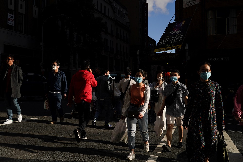 Pedestrians walk through the city centre following months of lockdown orders to curb the Covid-19 outbreak, in Sydney, Australia October 20, 2021. u00e2u20acu2022 Reuters pic