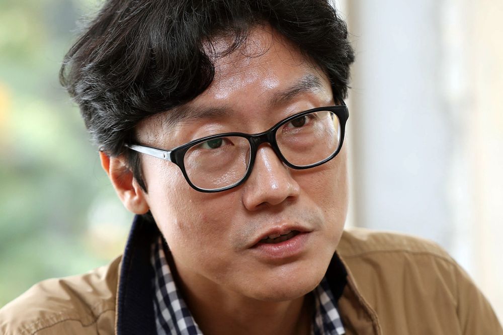 South Korean director Hwang Dong-hyuk of the Netflix series u00e2u20acu02dcSquid Gameu00e2u20acu2122 speaking during an interview in Seoul October 26, 2021. u00e2u20acu2022 AFP picnnn